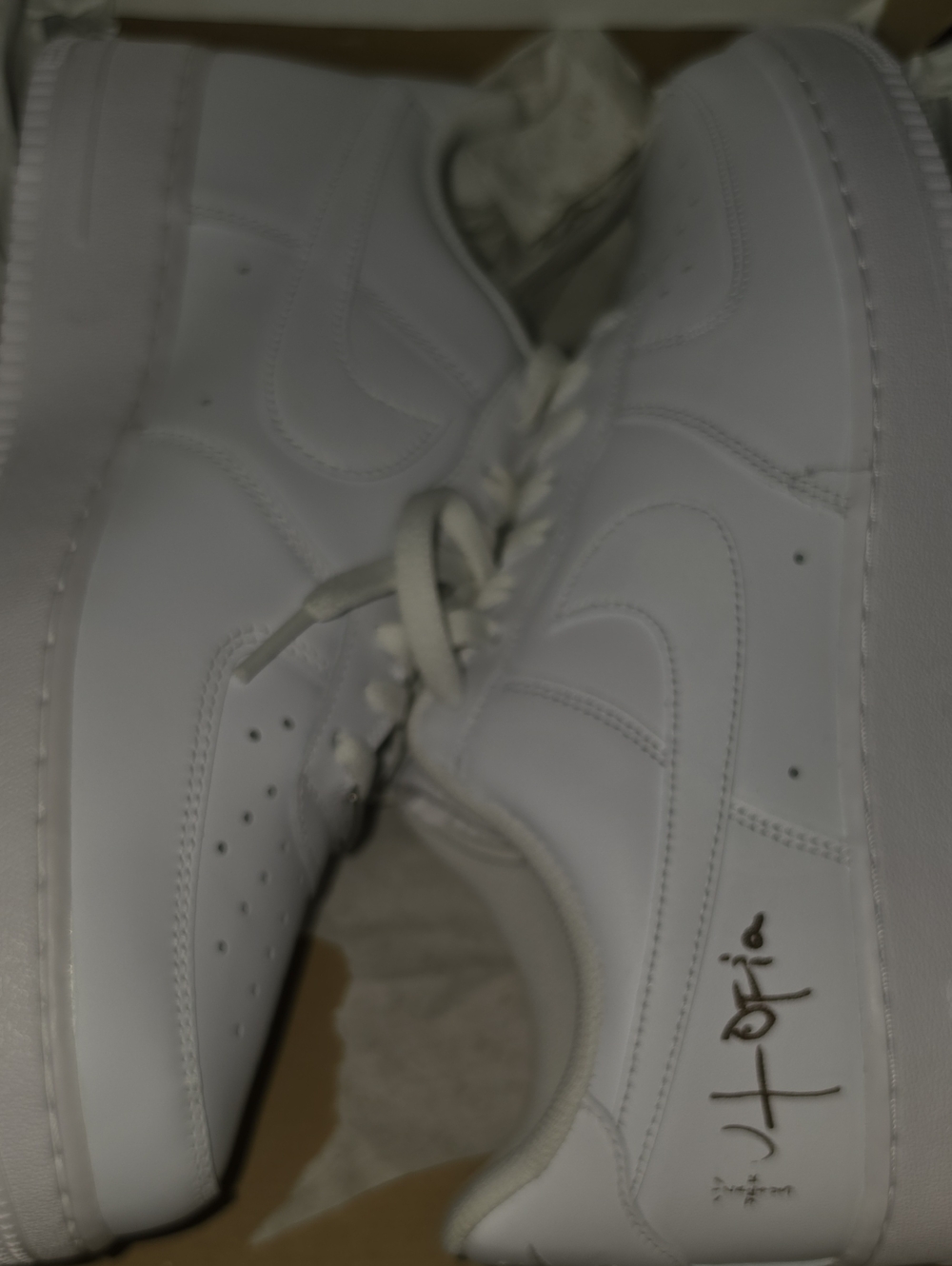 Travis Scott White Leather Low-Top Sneakers with Signature Heel Accent